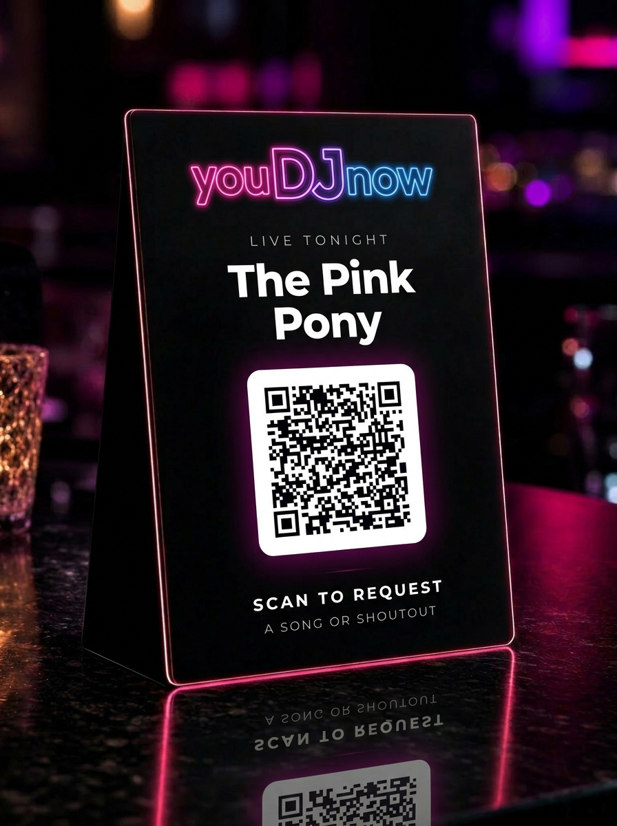 YouDJNow branded table tent with QR code on a nightclub table